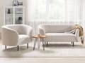 Pikkukuva 4 / 10: Sohva beige kangas verhoiltu mustat rautajalat kahdelle kaareva perinteinen glamour tyyli