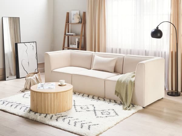 Sohva vaalea beige kolmelle vakosamettiverhoilu modulaarinen koristetyyny minimalistinen