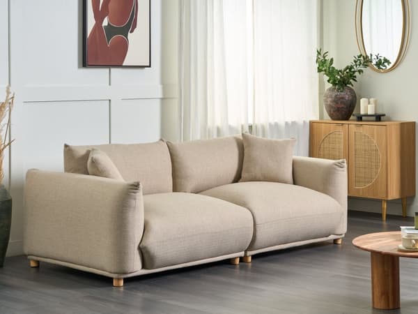 Sohva vaalea beige polyesteri kangasverhoilu kolmelle koristetyynyillä
