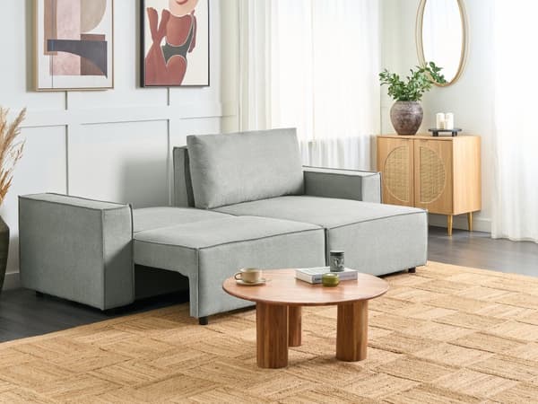 Venstrehånds hjørnesofa i grått stoff med polyesterpolstring 3-seters L-formet seng med puter Sovefunksjon Moderne stil Stue