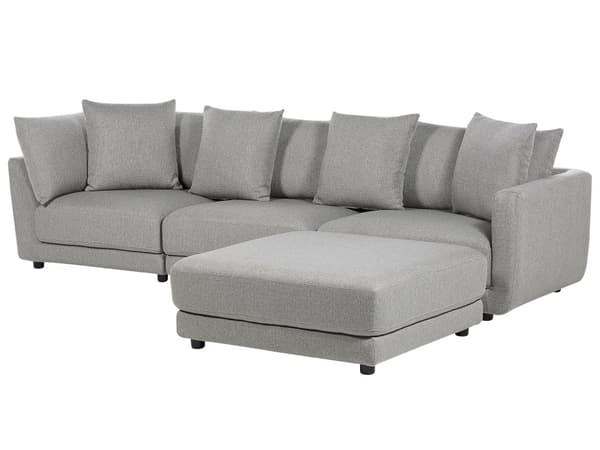 En brun polstret 3-personers sofa med skammel Moderne stuesofa