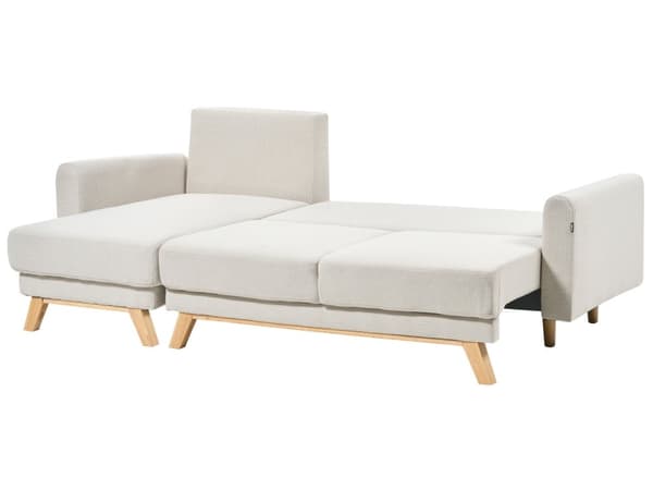 Kulmasohva vaalea beige kolmelle kangasverhoilu tikattu oikea vuodesohva skandinaavinen
