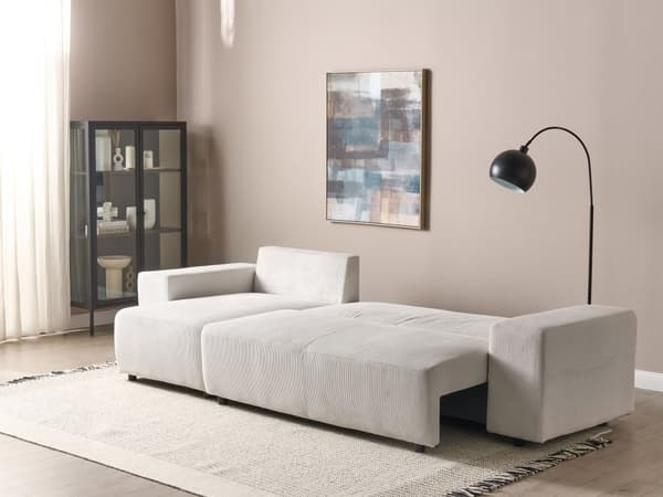 Kulmavuodesohva vaalea beige kolmelle vakosamettiverhoilu oikea säilytystila koristetyynyt moderni