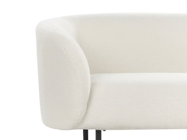 Sohva valkoinen bukleekangas verhoiltu mustat rautajalat kahdelle pörröinen kaareva perinteinen glamour tyyli