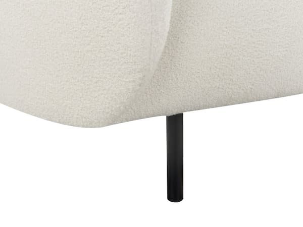 Sohva valkoinen bukleekangas verhoiltu mustat rautajalat kahdelle pörröinen kaareva perinteinen glamour tyyli