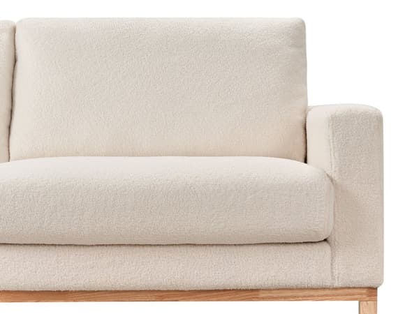 Højrevendt hjørnesofa hvid kraftig boucle beklædning træben stilfuld moderne stil