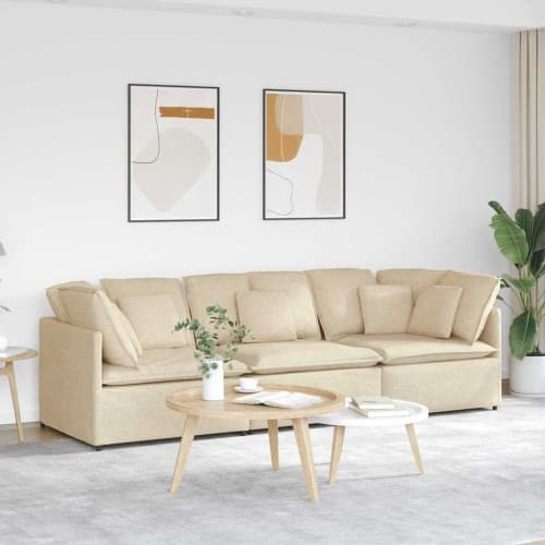 Modulsoffa med kuddar i krämfärgat tyg