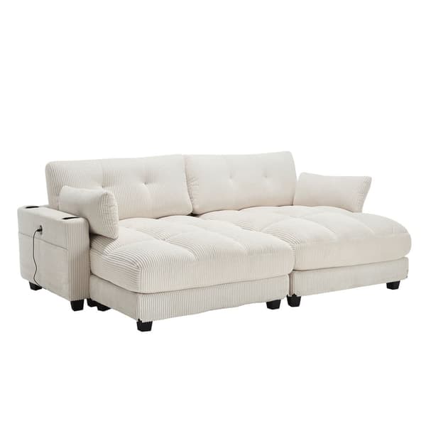 Beige palmesofa med bløde stribede hynder, rullegelændere, nakkestøtte med klap, tre kopholdere og sidelomme