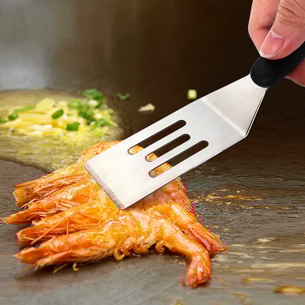 INF Ruostumattomasta teräksestä valmistettu pannukakkulastalla grillaukseen