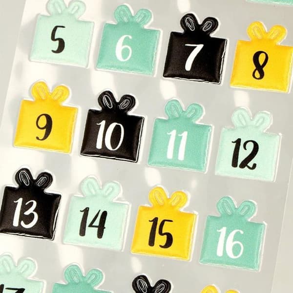 24 puffiga julklistermärken - adventssiffror