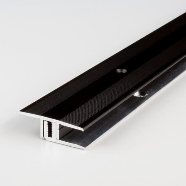 Tröskelprofil av anodiserad aluminium mörkbrons L 33 mm H 7 - 15 mm Längd 1000 mm Förborrad