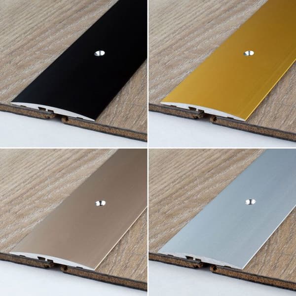 Tröskelbar i anodiserad aluminium bronsljus L 58 mm H 4 mm Lång 2700 mm Genomgående hål