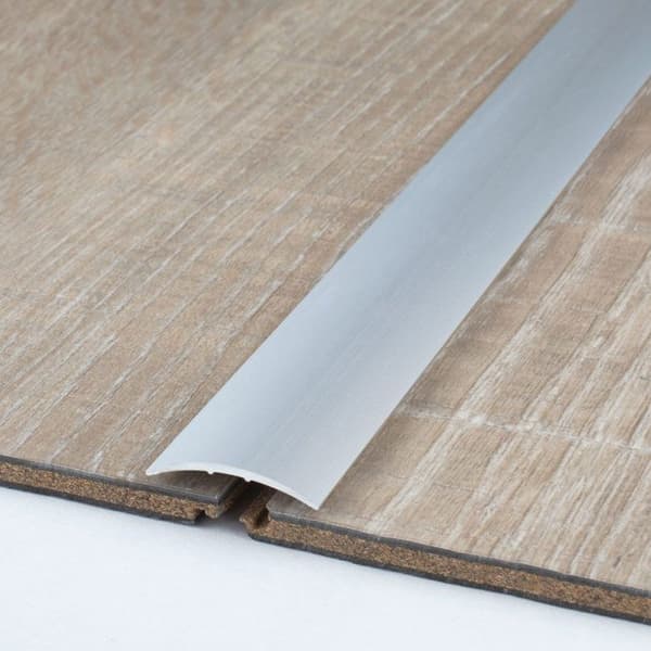 Transitionprofil 28 mm typ 05 anodiserad aluminium centralhål eller häftande -gold-900-hålad