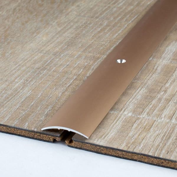 Transitionprofil 28 mm typ 05 anodiserad aluminium centralhål eller häftande -gold-900-hålad