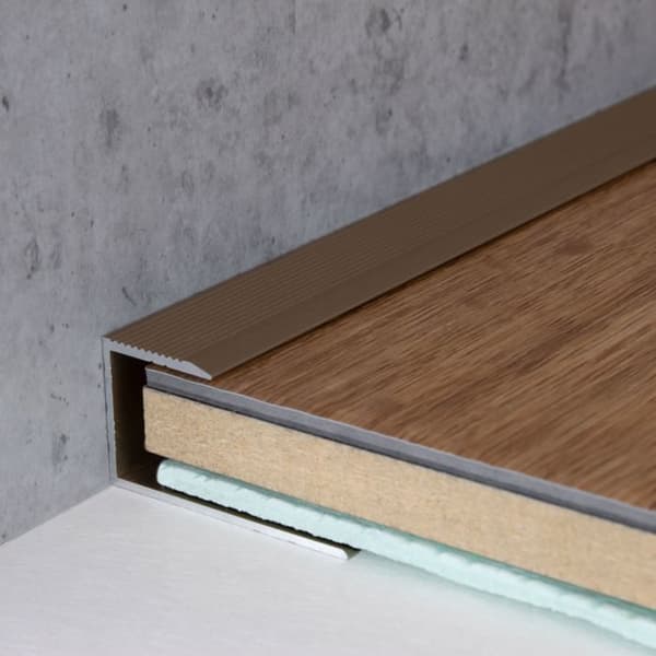 Infällnadsprofil för parkett H med inramning 15,3 mm anodiserad aluminium perforerad ljusbrons-2700