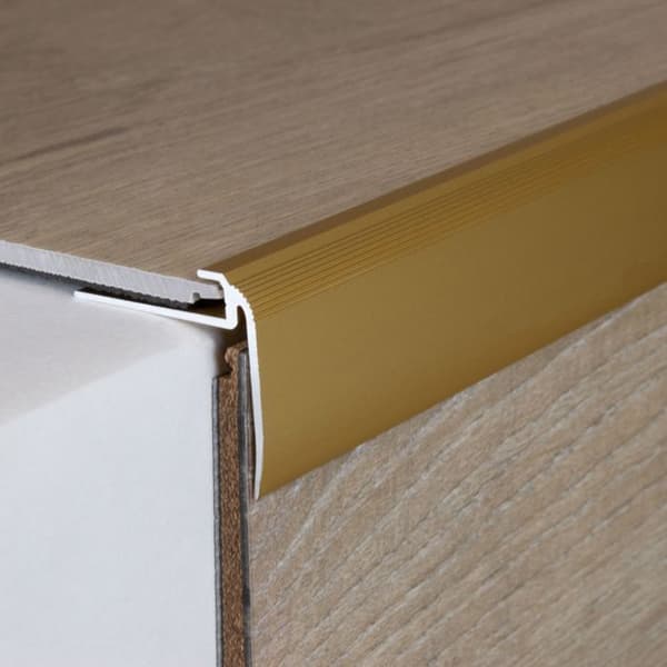 Insatsprofil med näs för designbeläggningar H av ram 4,5 mm anodiserad aluminium borrad-guld-900