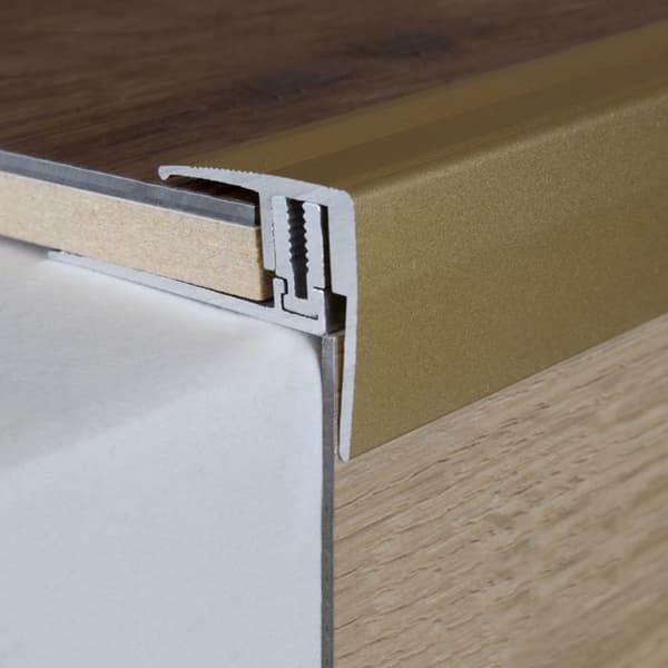 Nez de marche för laminatparkett hörn H 7 x 15,5 mm l 28 mm i 3 delar anodiserat aluminium med hål Flex-guld-2700