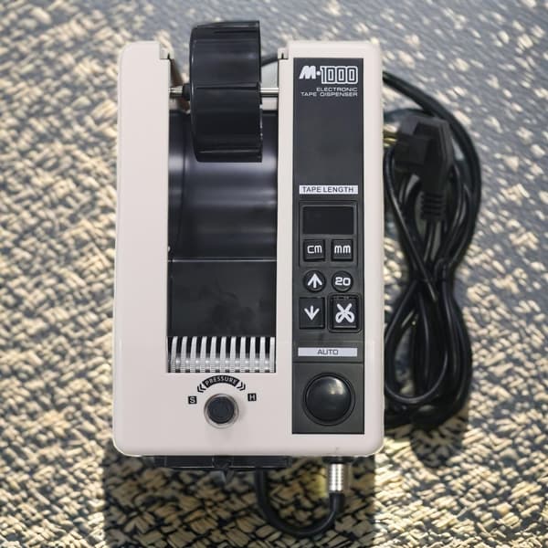 Automatisk tejpdisk, fritt justerbar längd, dubbla driftslägen, kapacitet för flera tejpklipp,M-1000