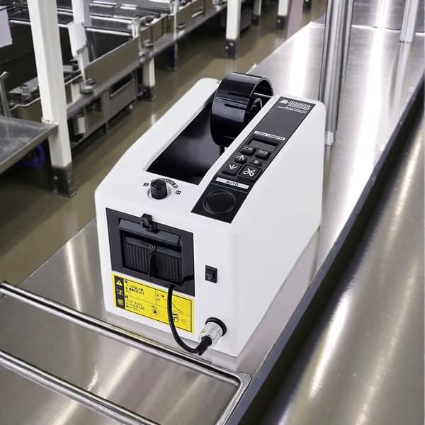 M-1000S Automatisk Tape Dispenser, Justerbar Længde 5-999mm, Bred Tape Kompatibilitet 7-50mm, Kompakt Design