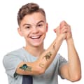 Miniatyrbild 3 av 3: Dinosaurie Tattoo