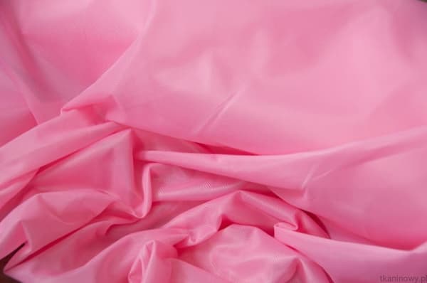 Stickat tyg slätt dederon rosa