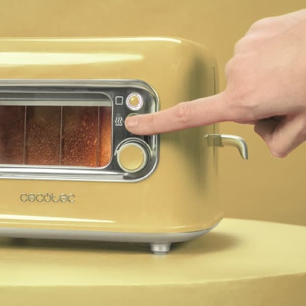 Cecotec Toaster with glass window, retro design, and dust cover.