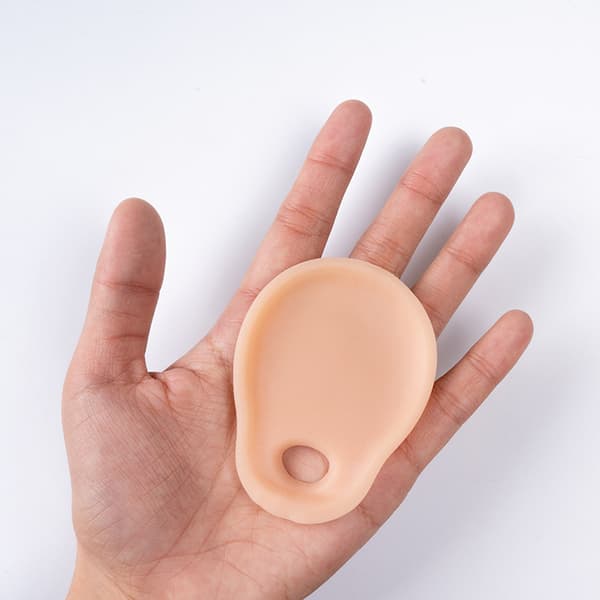 INF Hudfarget tåermer for lindring av knyst og tåbeskyttelse Beige0