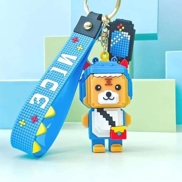 Kreativ pixel vind tecknad kors klänning liten tiger silikon nyckelring metall nyckelring ring söt väska hänge blå nyckelring