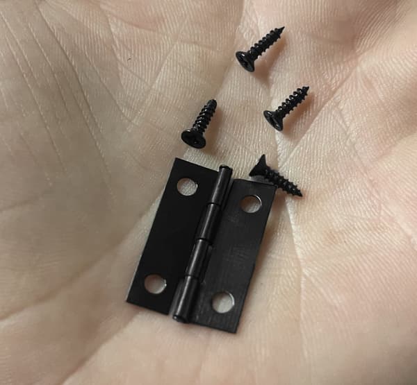 Sæt med 60 mini sorte jernhængsler (24x16 mm)