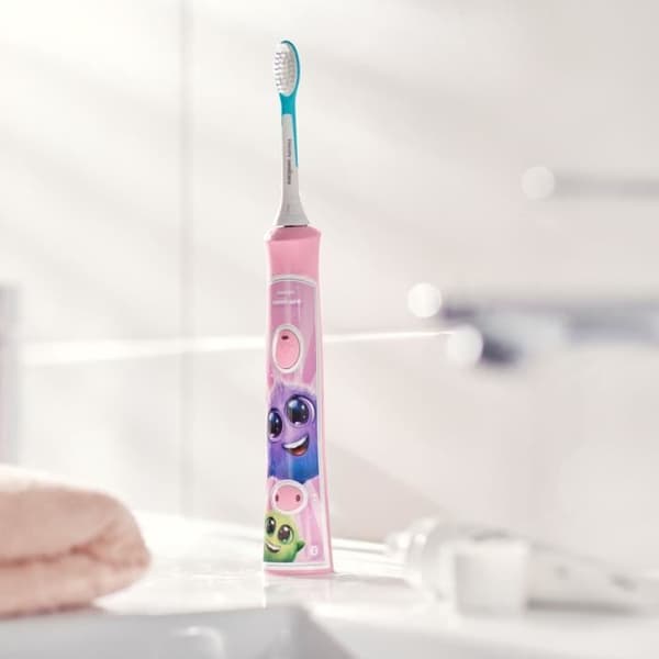 PHILIPS SONICARE HX6352/42 ansluten elektrisk tandborste för barn (2 lägen 3+ och 7+ - Rosa) + 2 borsthuvuden