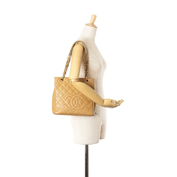 Pre-owned Chanel Caviar Petite Shopping Tote Brown