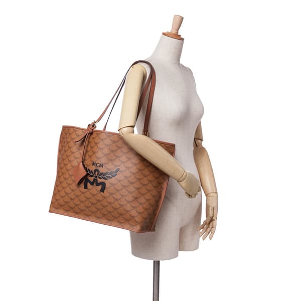Pre-owned MCM Medium Lauretos Coated Canvas Himmel Shopper Tote Brown