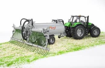 Bruder Fliegl barrel trailer with spread tubes toy