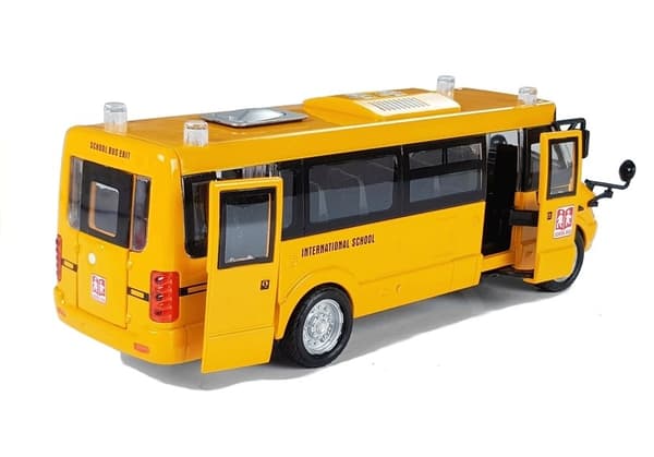 Metall skolbuss med spänd motor