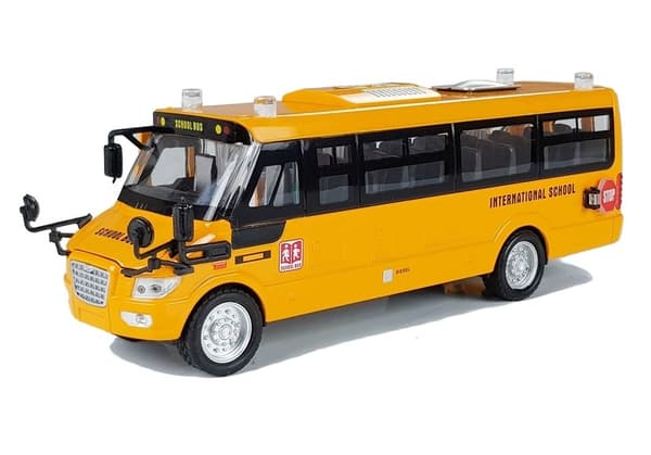 Metall skolbuss med spänd motor