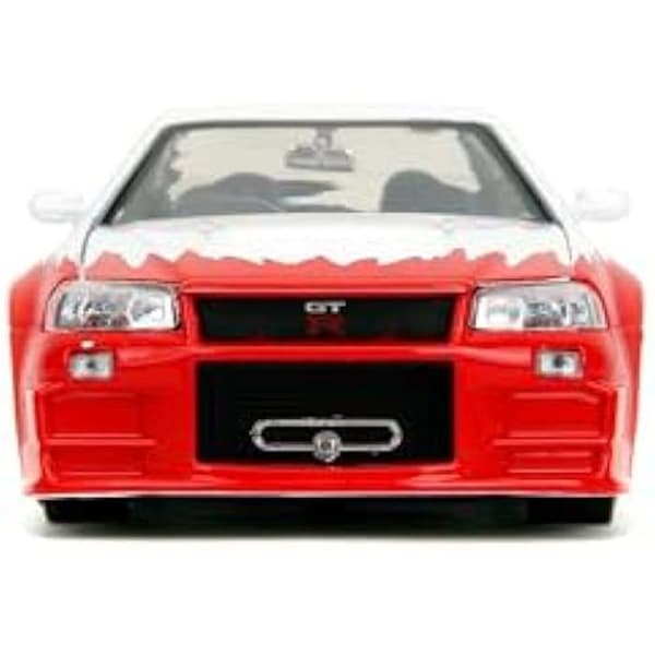 Minibil - JADA - Nissan Skyline GTR R34 - Inkluderar figur Rye - Skala 1:24 - Metall