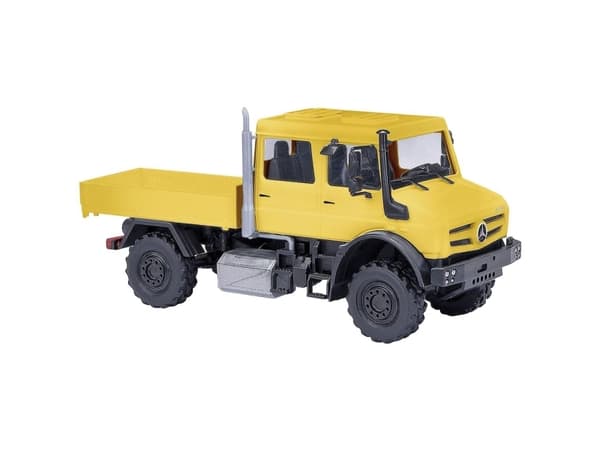 Busch 51080 H0 Lastbiler model Mercedes Benz Unimog U 5023, gul