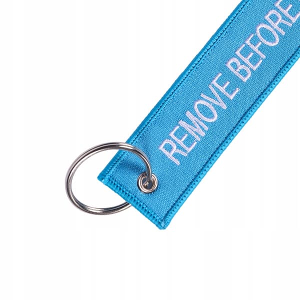 RBF REMOVE ENNEN LENTÄÄ Sininen avaimenperäriipus