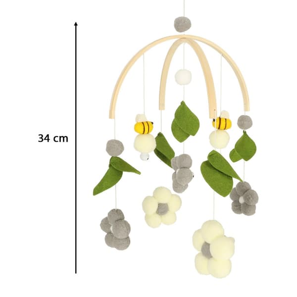 Träsängkarusell med plyschbi- och blomhängen