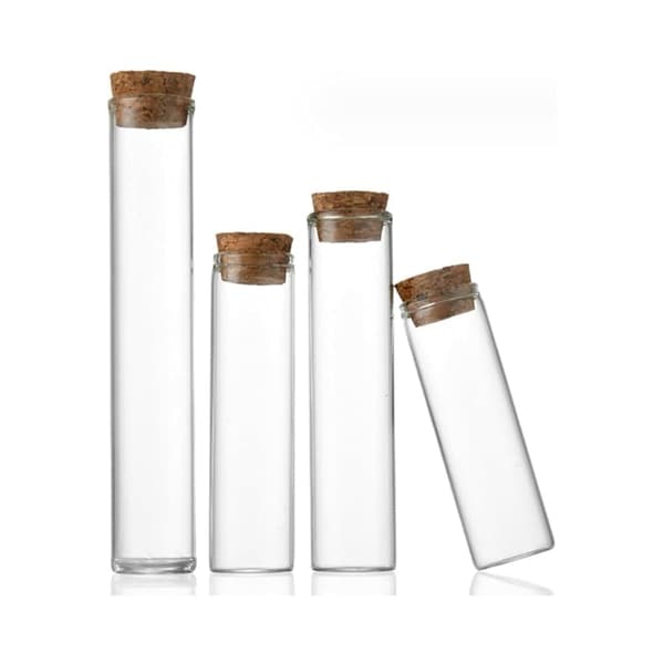 20 kpl 25 ml:n lasipulloja, -ampulleja, lasisia koeputkia korkilla, vuotamattomia, kosmeettisille eteerisille öljyille