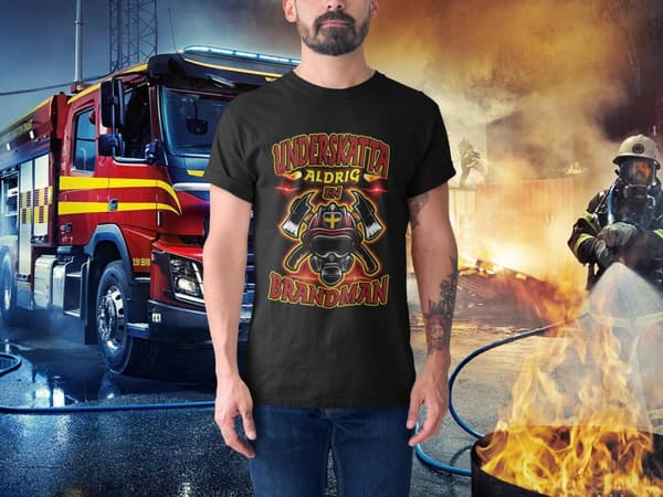 Underskatta aldrig en brandman T-shirt svart eld design