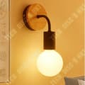 Miniatyrbild 4 av 4: TD® COREP Vägglampa Berkley rund fot i patinerat naturträ och målad metall - E27 40 W - Svart
