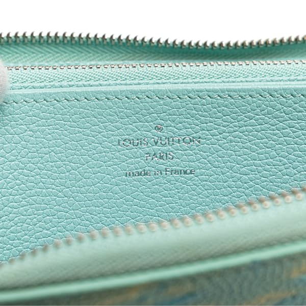 Pre-owned Louis Vuitton Monogram Empreinte Summer Stardust Zippy Wallet Blue