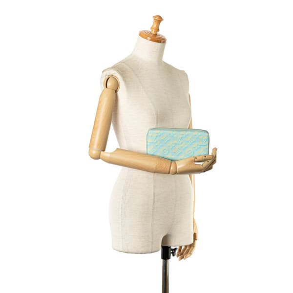Pre-owned Louis Vuitton Monogram Empreinte Summer Stardust Zippy Wallet Blue