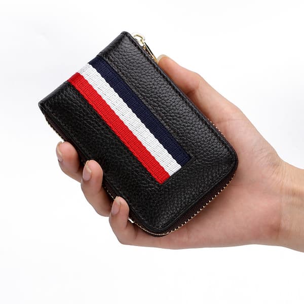 INF Vertikal myntväska i vävd textil med dragspelsöppning