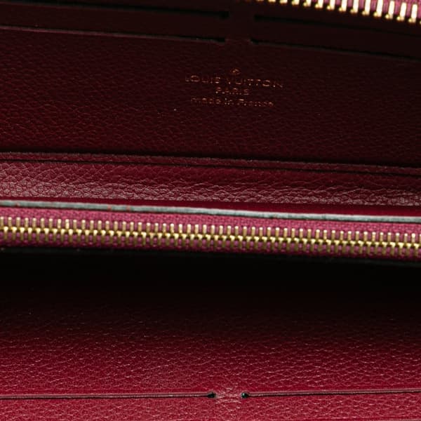 Pre-owned Louis Vuitton Monogram Empreinte Clemence Zippy Wallet Purple