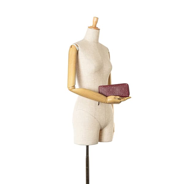 Pre-owned Louis Vuitton Monogram Empreinte Clemence Zippy Wallet Purple