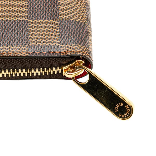 Pre-owned Louis Vuitton Damier Ebene Karakoram Zippy Wallet Brown