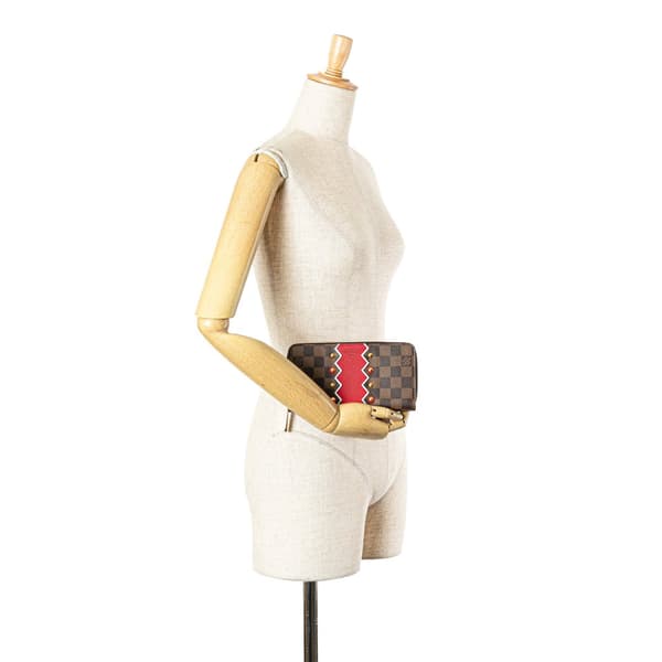 Pre-owned Louis Vuitton Damier Ebene Karakoram Zippy Wallet Brown