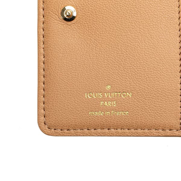 Pre-owned Louis Vuitton Monogram Embossed Coussin Lou Wallet Brown